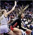  ?? ?? Kennedy Smith of Etiwanda, right, had 15 points, 5 rebounds and 4 blocks in Saturday’s victory over Archbishop Mitty.