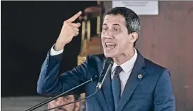  ?? Leonardo Fernandez Associated Press ?? VENEZUELAN opposition leader and self-proclaimed interim President Juan Guaido said in Caracas on Tuesday that the Maduro government is crumbling.