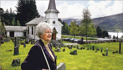  ??  ?? Ollie Gilker of Toronto contemplat­es the serene waters of Norway’s Midtgulen Fjord where her RCAF pilot husband perished six decades ago. “I feel at peace now,” she says. For six decades, Gilker, who lives in Toronto, did not know the details of her...