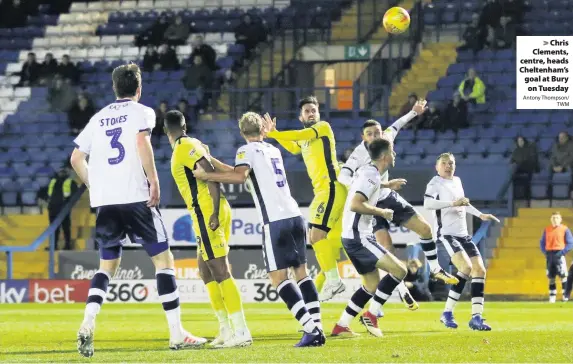  ?? Antony Thompson/
TWM ?? Chris Clements, centre, heads Cheltenham’s goal at Bury on Tuesday