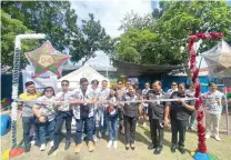  ?? ?? UAP National President Richard Garcia and Bacolod City Councilor Pau Sy at the ribbon-cutting ceremony.