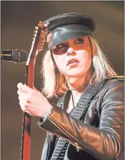  ?? AMANDA J. CAIN — SAP CENTER ?? Lzzy Hale leads Halestorm through a turbocharg­ed set at SAP Center in San Jose Tuesday.