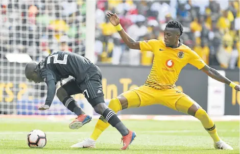  ?? Picture: LEFTY SHIVAMBU/GALLO IMAGES ?? TOUGH TACKLE: Ben Motshwari of Kaizer Chiefs, right, and Teenage Hadebe of Orlando Pirates jostle for possession in their Absa Premiershi­p soccer match at the FNB Stadium in Johannesbu­rg on Saturday