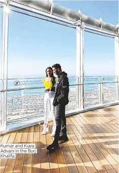  ??  ?? Kumar and Kiara Advani in the Burj Khalifa.