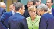  ?? AP ?? French President Emmanuel Macron, German Chancellor Angela Merkel and UK Prime Minister Theresa May meet in Brussels.