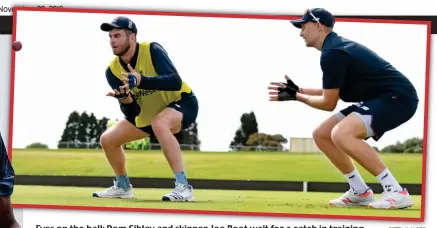  ?? GETTY IMAGES ?? Eyes on the ball: Dom Sibley and skipper Joe Root wait for a catch in training