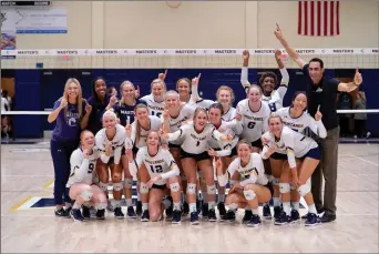  ?? Photo by Darcy Brown ?? TMU women’s volleyball celebrates winning the GSAC title outright on Saturday night at The Master’s University. The Mustangs will compete in the conference tournament this weekend in Fullerton.