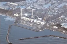  ?? -REUTERS ?? OKUMA, JAPAN
An aerial view shows the Fukushima Daiichi nuclear power plant following a strong earthquake, in Okuma town, Fukushima prefecture, Japan.