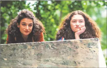  ?? AMAZON STUDIOS ?? Jenny Slate, left, and Abby Quinn play sisters who suspect their father is cheating in “Landline.”