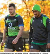  ??  ?? Robbie Henshaw and Bundee Aki arrive at Ireland training on Thursday to work on the centre partnershi­p that proved so successful for Connacht