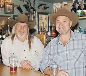  ??  ?? Scott Cozens and Sheldon Smithens appear in a bar in England on Season 4 of Canadian Pickers.