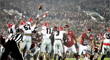  ?? AP/DOUG BENC ?? Georgia linebacker Lorenzo Carter (7) blocks a field goal attempt by Oklahoma in the second overtime at the Rose Bowl on Monday in Pasadena, Calif. Georgia won 54-48.