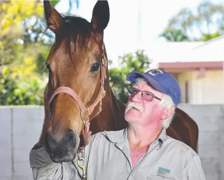  ?? BIG AMBITIONS: Cairns trainer John Kilroy with Townsville Guineas runner Luvya Beak. Picture: SHAE BEPLATE ??