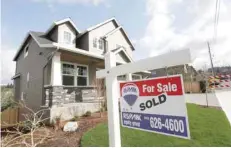  ?? — Reuters ?? A house is seen for sale in the northwest area of Portland, Oregon.