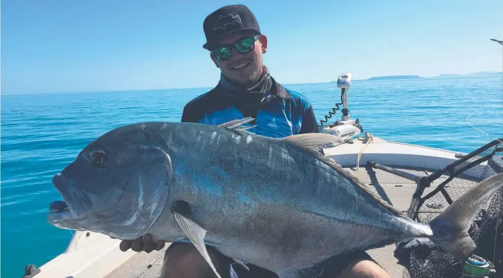  ??  ?? Kris Baker with a great GT, caught out of Port Warrender in the Kimberley. Matt Flynn Col Frontier