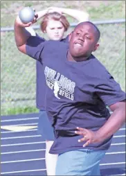  ?? Scott Herpst ?? Rossville’s Zaire Grissom launches the shot put during a multi-team middle school meet at Heritage last week. The NGAC Championsh­ips will be held back at Heritage next Tuesday and Wednesday.