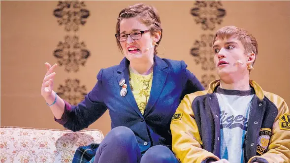  ?? Evan Buhler /Edmonton Journal ?? Ruth Moore, left, played Christine and Wyatt Marchuk portrayed Barry in the Cappies show, The Nut Factory at Austin O’Brien High School.
