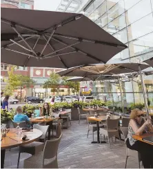  ??  ?? STEAK OUT: Enjoy wagyu beef at Del Frisco’s Back Bay patio, above. Check out Cisco’s Seaport pop-up, inset.