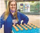  ??  ?? Sarah Rutter poses with bottles of Gatorade, which were donated by members of Manchester Valley High School’s girls lacrosse team.