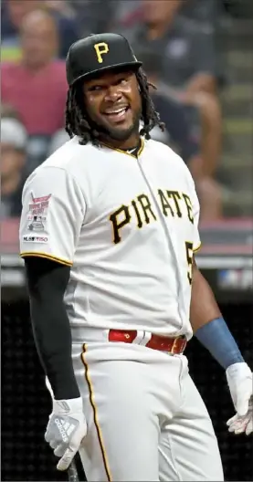  ?? Matt Freed/ Post- Gazette ?? Josh Bell takes a break in his first- round match against Atlanta’s Ronald Acuna Jr. Monday in the Home Run Derby at Progressiv­e Field in Cleveland. Bell hit 18 home runs, but Acuna had 25 to advance.