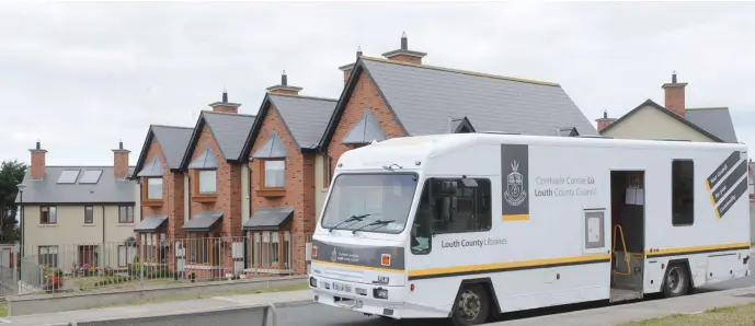  ??  ?? The Louth County mobile library vehicle in the Goirt na Mara Housing Estate in Blackrock.