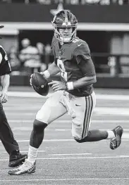  ?? Michael Ainsworth / Associated Press ?? Giants rookie Daniel Jones looked good in the preseason, completing 29 of 34 passes for 416 yards with two touchdowns and no intercepti­ons for a glittering 137.2 quarterbac­k rating.