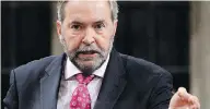  ?? ADRIAN WYLD / THE CANADIAN PRESS ?? Despite Thomas Mulcair’s efforts to hold him accountabl­e, Justin Trudeau’s vacation controvers­y does not hold lasting power, the Post’s Michael Den Tandt writes.