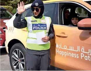  ??  ?? The happiness patrol initiative launched by the Abu Dhabi Police has gained attention worldwide.