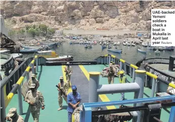  ?? Reuters ?? UAE-backed Yemeni soldiers check a boat in Mukalla in April last year