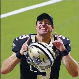  ?? BUTCH DILL — THE ASSOCIATED PRESS ?? Saints QB Drew Brees rejoices after Sunday’s season-opening win over the Buccaneers.