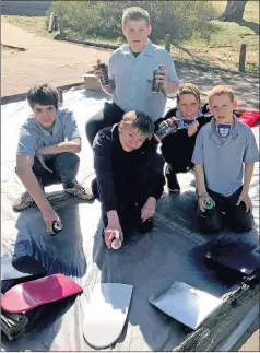  ??  ?? UNIQUE ART: Horsham College Mckenzie Creek students, from left, Kyle Mclean, Brayden Foley, Jeremy Chambers, Ji Marra and Aron Hale paint skateboard­s for a bench seat project. Absent from the picture are Michael Taylor and Kayne Higgins.