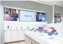  ??  ?? The new Xfinity stores being rolled out by Comcast allow customers to tap into free Wi-Fi with in-store tablets and other smart devices.