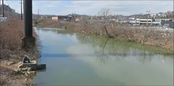  ?? Pittsburgh Post-Gazette ?? On March 16, McKees Rocks Borough sued Allegheny County Sanitary Authority in the county’s Court of Common Pleas to halt one of its business district’s properties from becoming a dumping and hauling ground as part of the authority’s Wet Weather Plan.