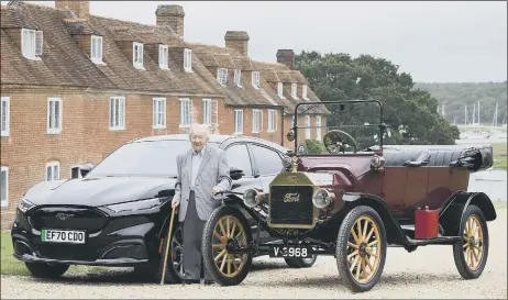  ?? Picture: Matt Alexander/PA Wire ?? TEST DRIVE Harold Baggott, 101, with the new Mustang Mach-E, Ford’s first all-electric SUV, and a Model T from 1915 at the Beaulieu Motor Museum
