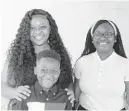  ?? HABITAT FOR HUMANITY OF BROWARD ?? New Habitat for Humanity of Broward homeowner Shequila Jones with her children in their new home.