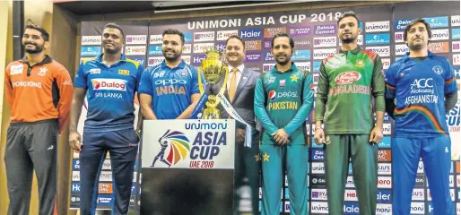  ?? Photo by Neeraj Murali ?? CAPTAINS’ CALL: Anshuman Rath, Angelo Mathews, Rohit Sharma, Binay Shetty, Executive Director, Finablr, Sarfraz Ahmed, Mashrafe Mortaza and Asghar Stanikzai attended the unveiling of the Unimoni Asia Cup 2018 at the Dubai Internatio­nal Cricket Stadium on Friday. —