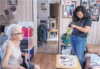  ?? ROBERTO E. ROSALES/JOURNAL ?? Keily Castro photograph­s neighbor Anthony Crespin. The pair were involved in the Youth Employment Summer Institute and Working Classroom’s “Las Voces de Barelas.”
WHEN: 10 a.m.4 p.m. Saturday, Oct. 21
WHERE: Casa Barelas, 1024 Barelas SW HOW MUCH: Free