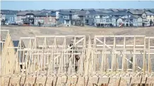  ?? GAVIN YOUNG ?? The level of new home constructi­on is being affected by “unabsorbed inventory” on the market, CMHC says.