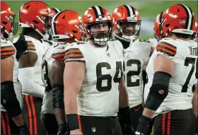  ?? SETH WENIG - THE ASSOCIATED PRESS ?? FILE - Cleveland Browns center JC Tretter (64) talks to teammates during the first half of an NFL football game against the New York Giants on Dec. 20, 2020, in East Rutherford, N.J.