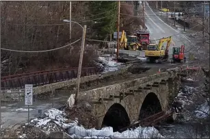  ?? Joseph B. Nadeau/The Call ?? Work being done at the historic Slatersvil­le Stone Arch Bridge on Railroad Street is on schedule, according to Town Administra­tor Gary Ezovski.