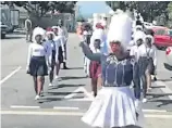  ?? Picture: DEVON KOEN ?? DRUMMING UP SUPPORT: Church drum majorettes march outside the Port Elizabeth High Court