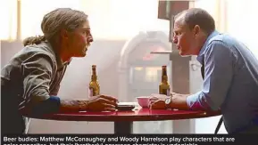  ??  ?? Beer budies: Matthew McConaughe­y and Woody Harrelson play characters that are polar opposites, but their (brotherly) onscreen chemistry is undeniable.