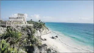  ??  ?? The site of the walled city of Tulum will be one of the attraction­s to ‘Mundo Maya’ ... apocalypti­c projection or not.