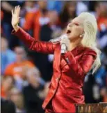  ?? AP PHOTO/JAE C. HONG ?? Lady Gaga sings the national anthem before the NFL Super Bowl 50 football game in Santa Clara, Calif. Lady Gaga is reportedly planning an (unconfirme­d) stunt during Super Bowl LI by performing from the roof of the stadium during the big game.