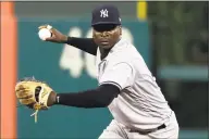  ?? Matt Slocum / Associated Press ?? The Yankees’ Didi Gregorius needs Tommy John surgery on his right elbow after injuring himself making a throw in Boston during the AL Division Series, and there’s no telling exactly when he’ll be able to play again.