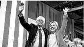  ?? ANDREW HARNIK/AP ?? Hillary Clinton and Sen. Bernie Sanders wave to supporters during a Democratic rally July 12, 2016, in Portsmouth, N.H., where Sanders endorsed Clinton for president.