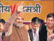  ?? RAJEEV TYAGI/HT ?? Union home minister Amit Shah during a rally at Najafgarh in New Delhi on Wednesday.