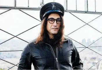  ?? MATT LICARI/INVISION ?? Sean Ono Lennon, seen on the Empire State Building observatio­n deck, helped produce a reworking of his dad’s catalog.