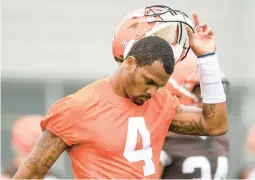  ?? GETTY FILE ?? New Browns QB Deshaun Watson will settle 20 of 24 lawsuits in which massage therapists accuse him of harassing, assaulting or touching them during appointmen­ts.