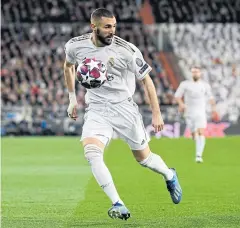  ?? AFP ?? Real Madrid forward Karim Benzema controls the ball.